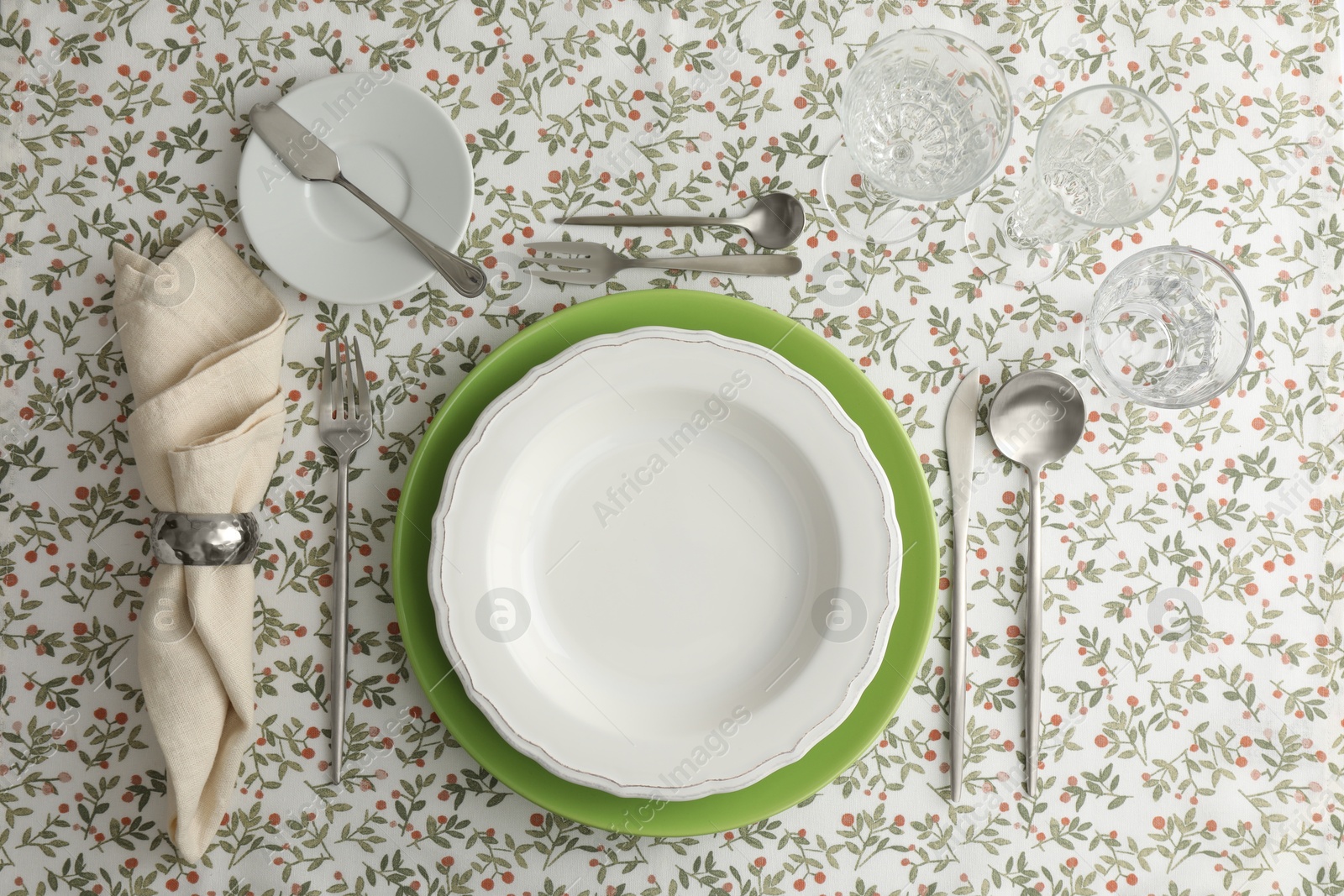 Photo of Stylish setting with cutlery, plates, napkin and glasses on table, flat lay
