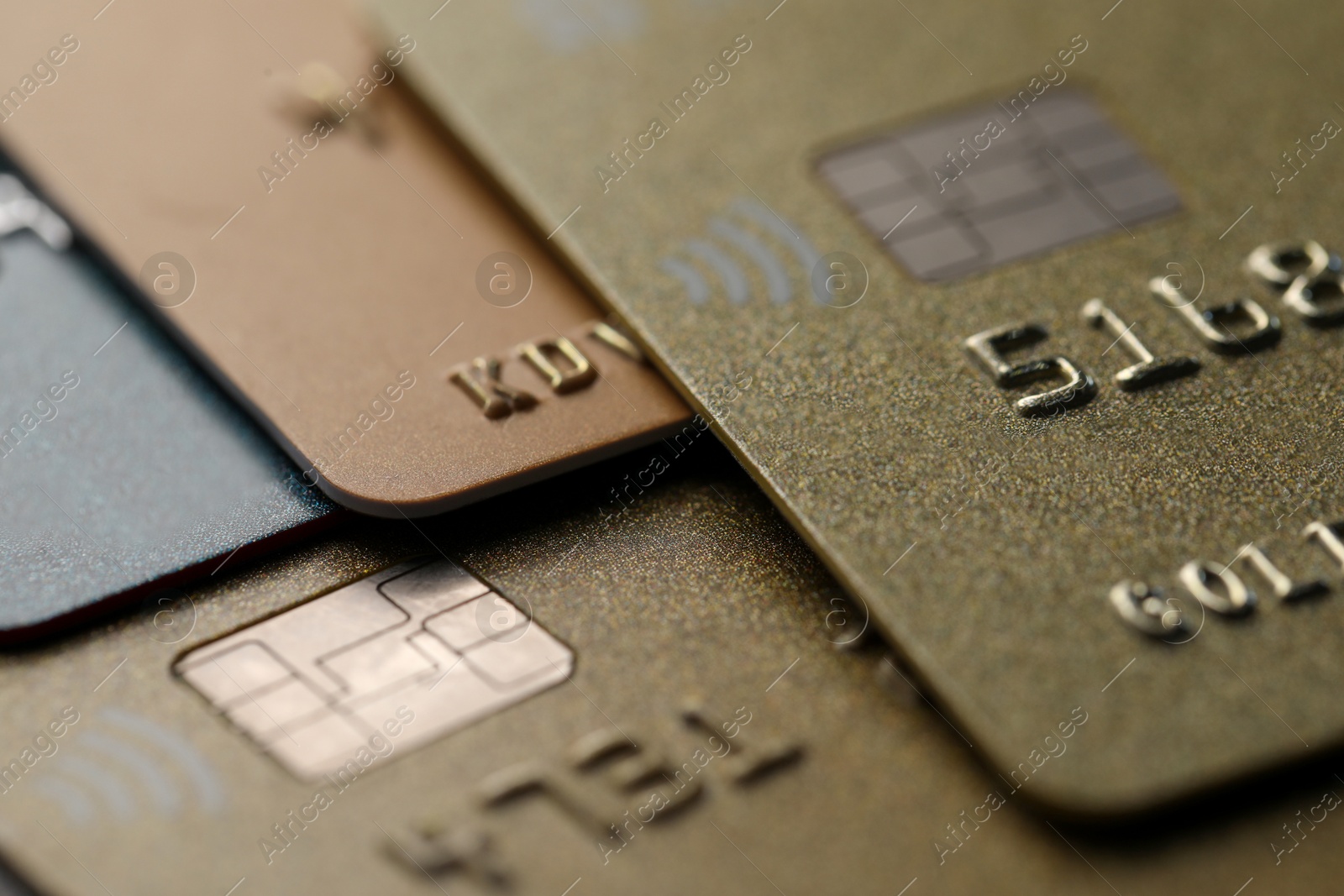 Photo of Different plastic credit cards as background, macro view