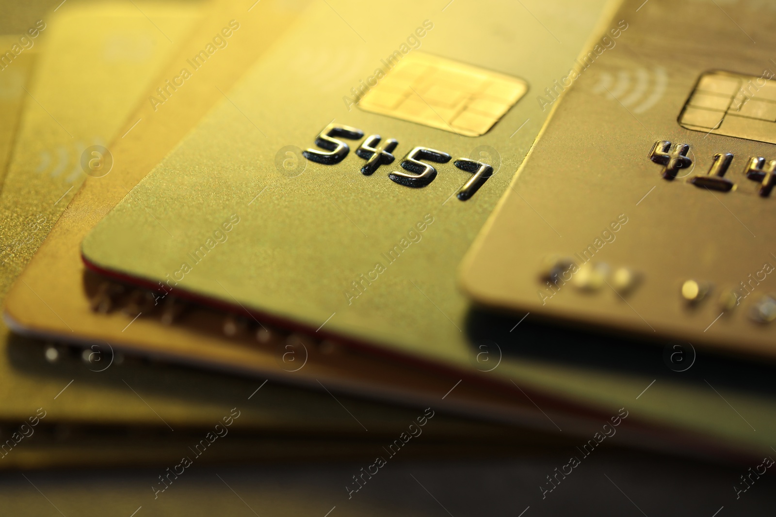 Photo of Plastic credit cards on table, macro view