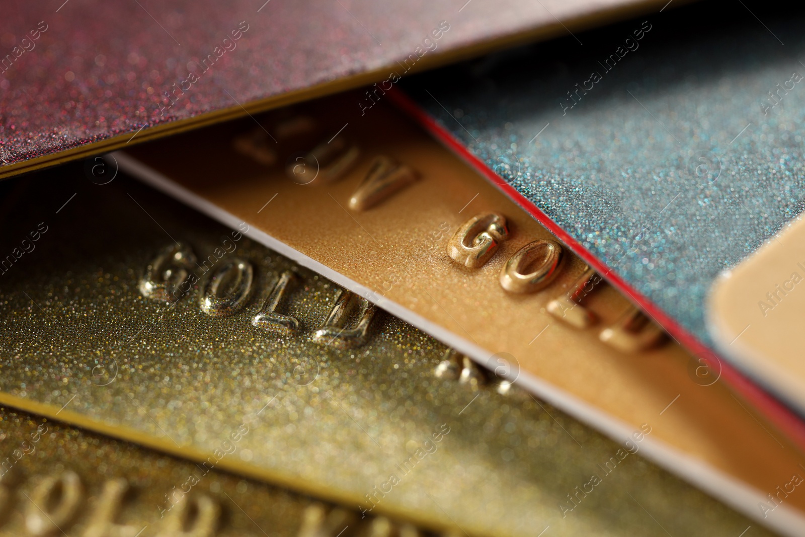 Photo of Different plastic credit cards as background, macro view