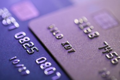 Photo of Two plastic credit cards as background, macro view