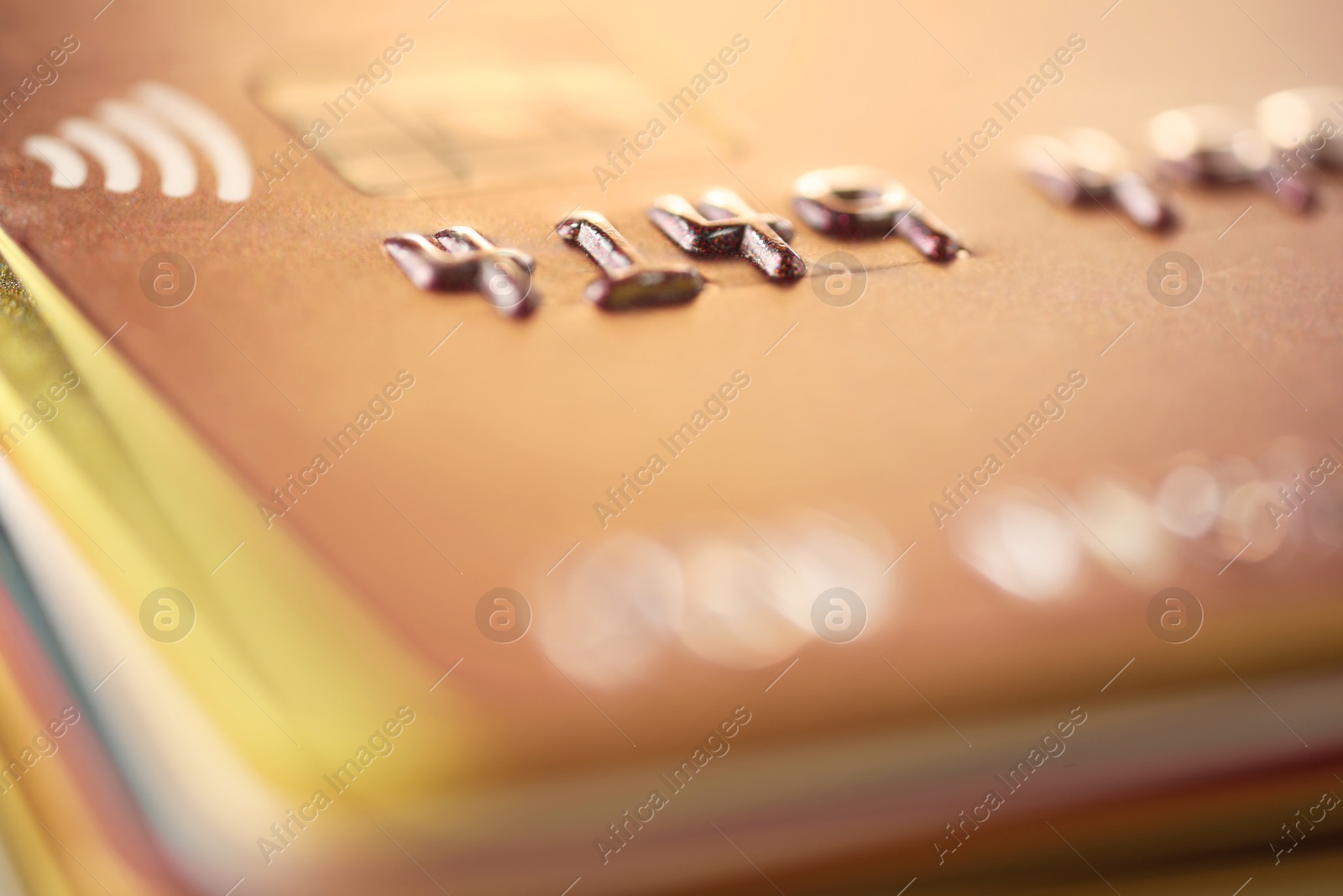 Photo of Different plastic credit cards as background, macro view