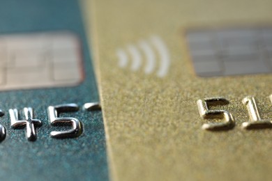 Photo of Two plastic credit cards as background, macro view