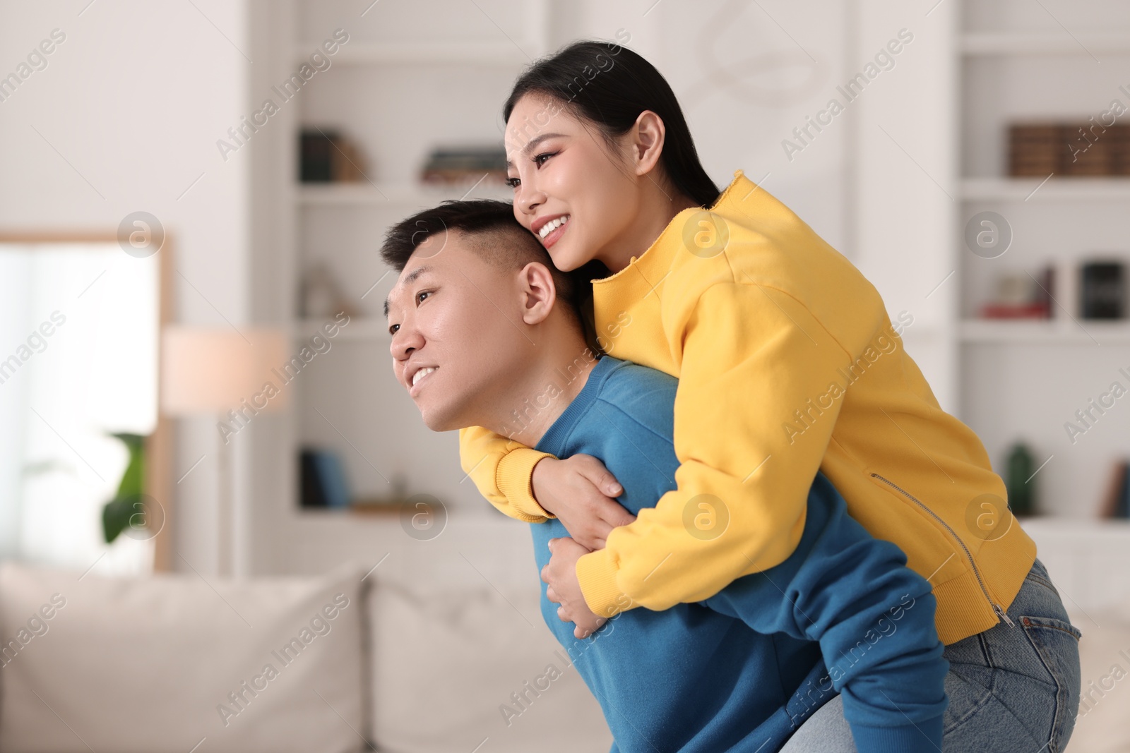 Photo of Happy couple spending time together at home