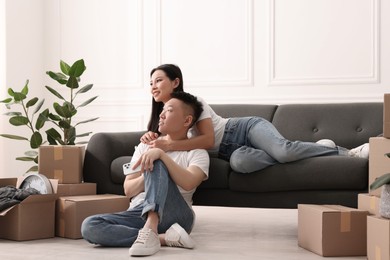 Happy young couple in their new apartment