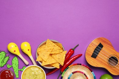 Flat lay composition with nachos chips and Mexican sombrero hat on purple background, space for text