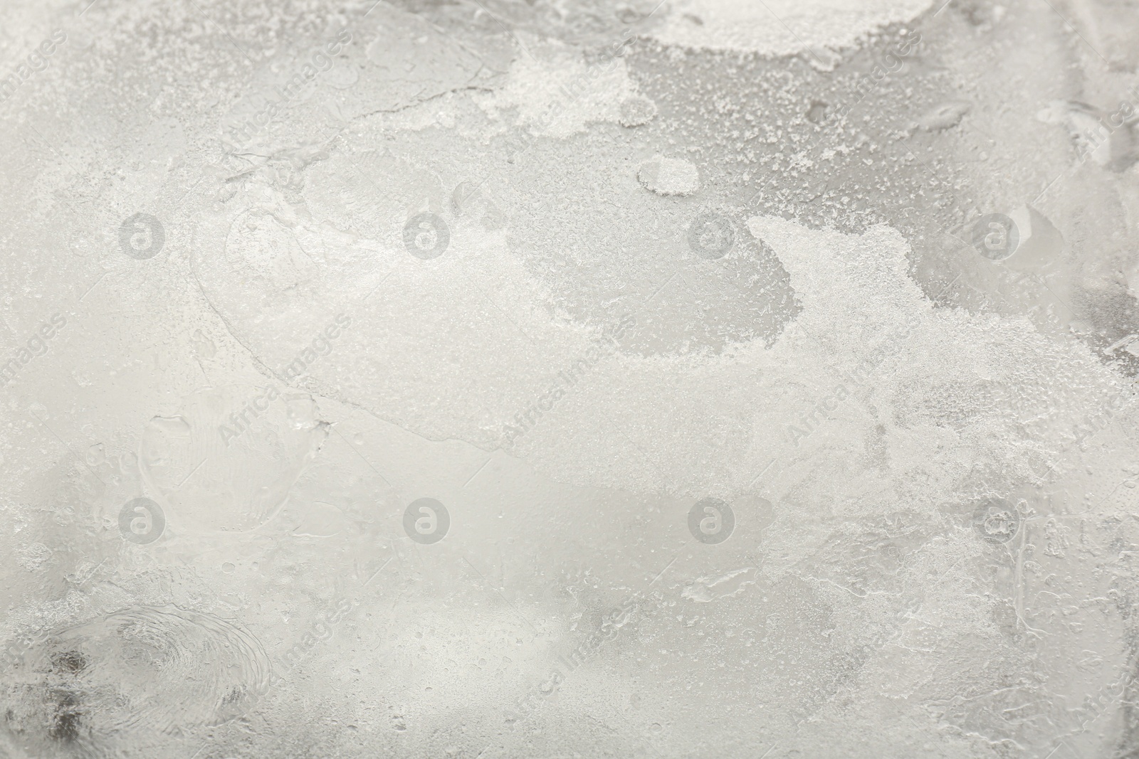 Photo of Crystal clear ice as background, closeup view