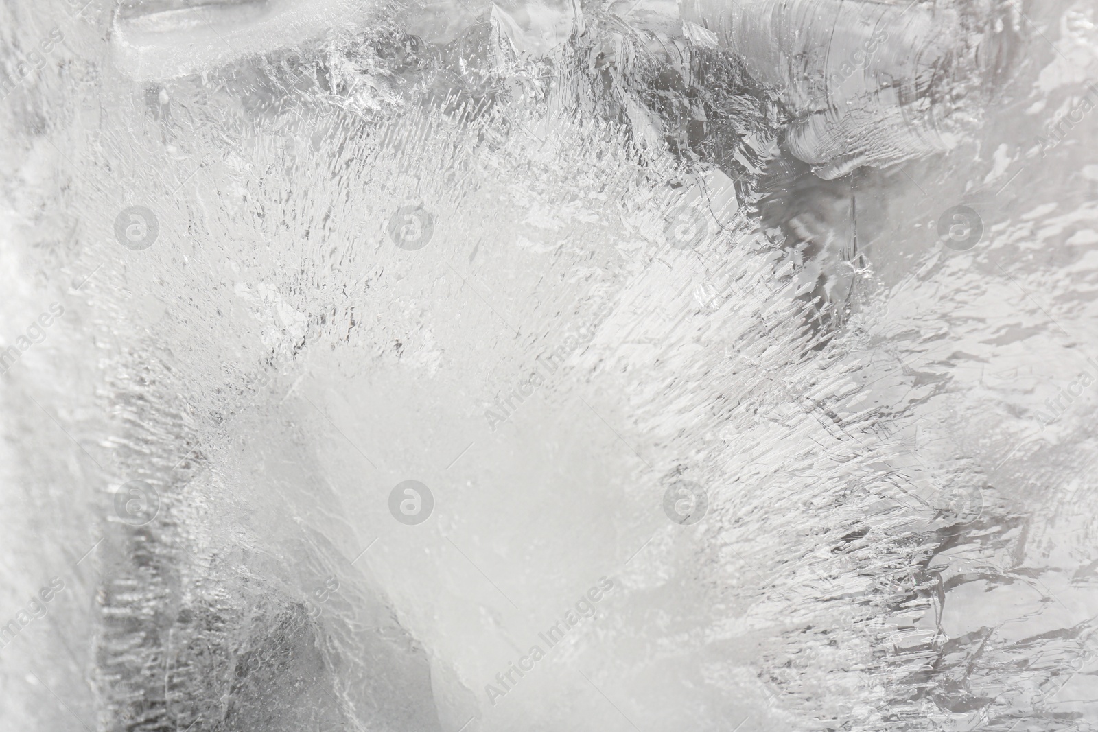 Photo of Crystal clear ice as background, closeup view