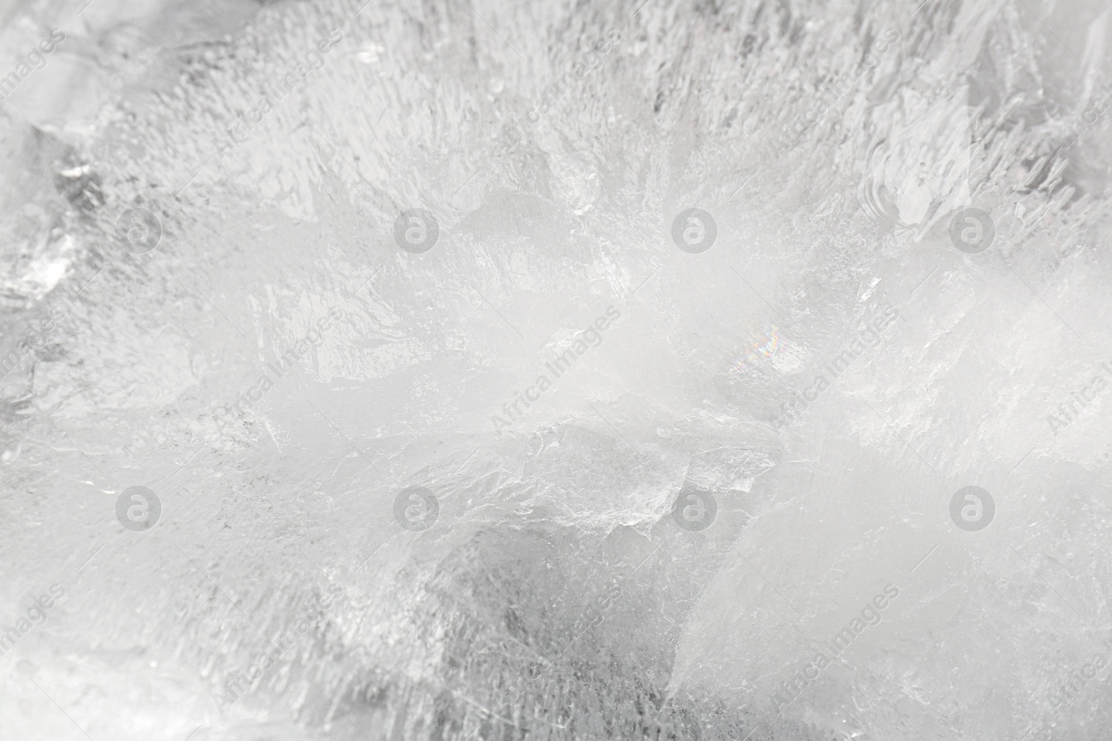 Photo of Crystal clear ice as background, closeup view