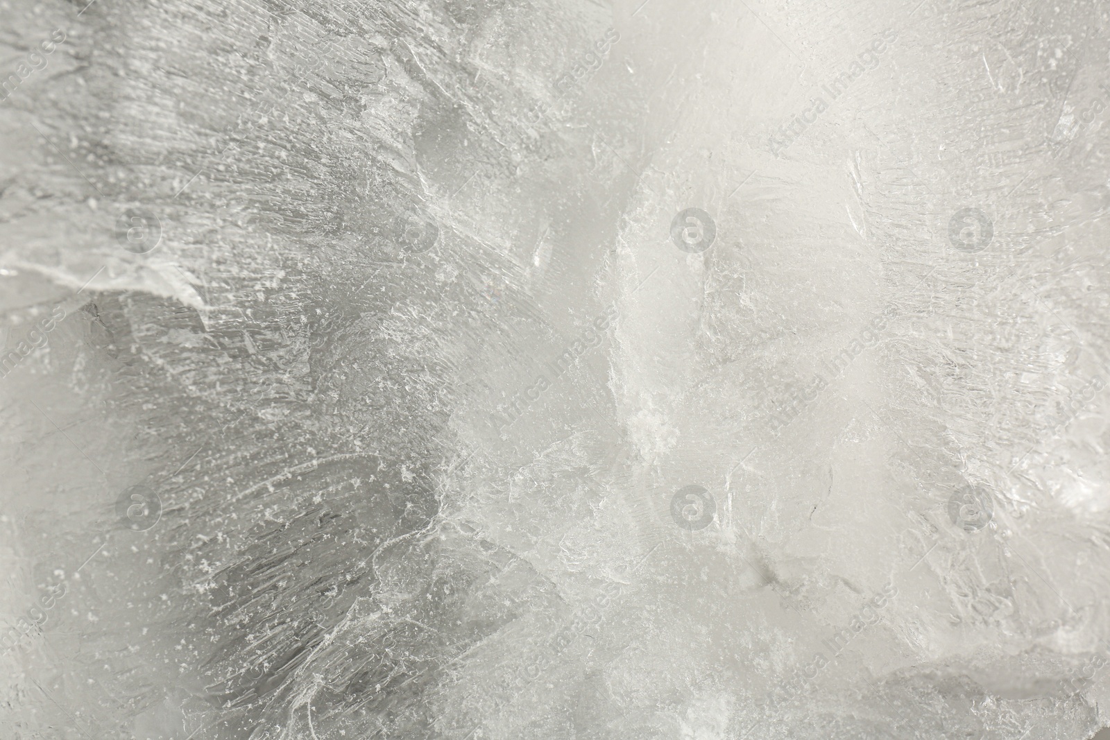 Photo of Crystal clear ice as background, closeup view