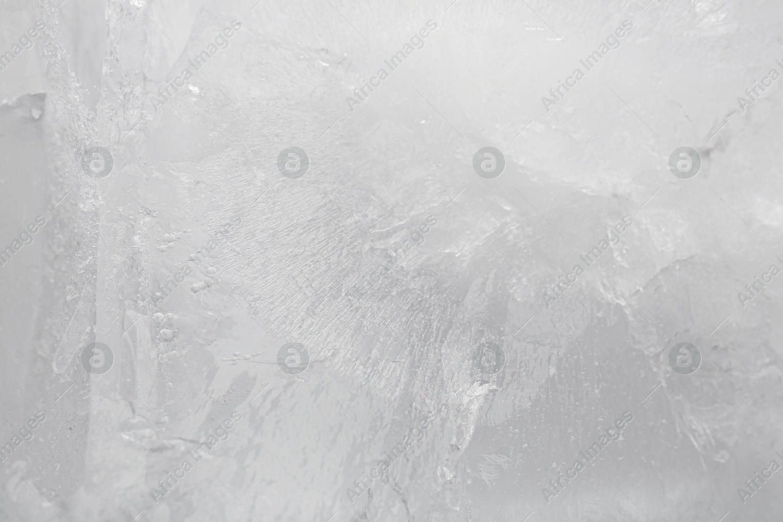 Photo of Crystal clear ice as background, closeup view