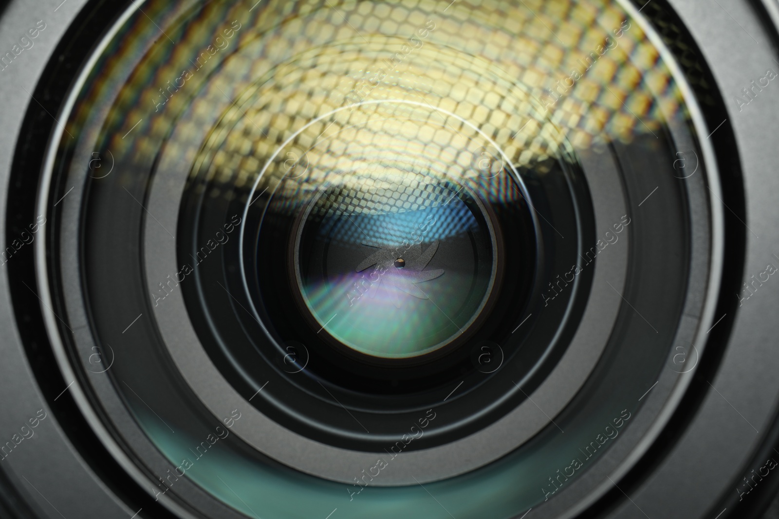 Photo of Lens of professional camera, closeup. Photographer's equipment