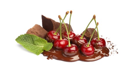 Photo of Fresh cherries with chocolate and mint isolated on white