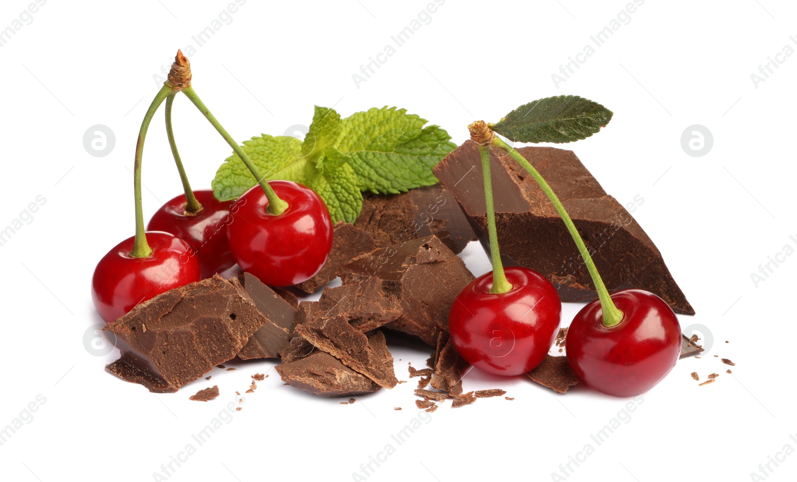 Photo of Fresh cherries with pieces of dark chocolate and mint isolated on white