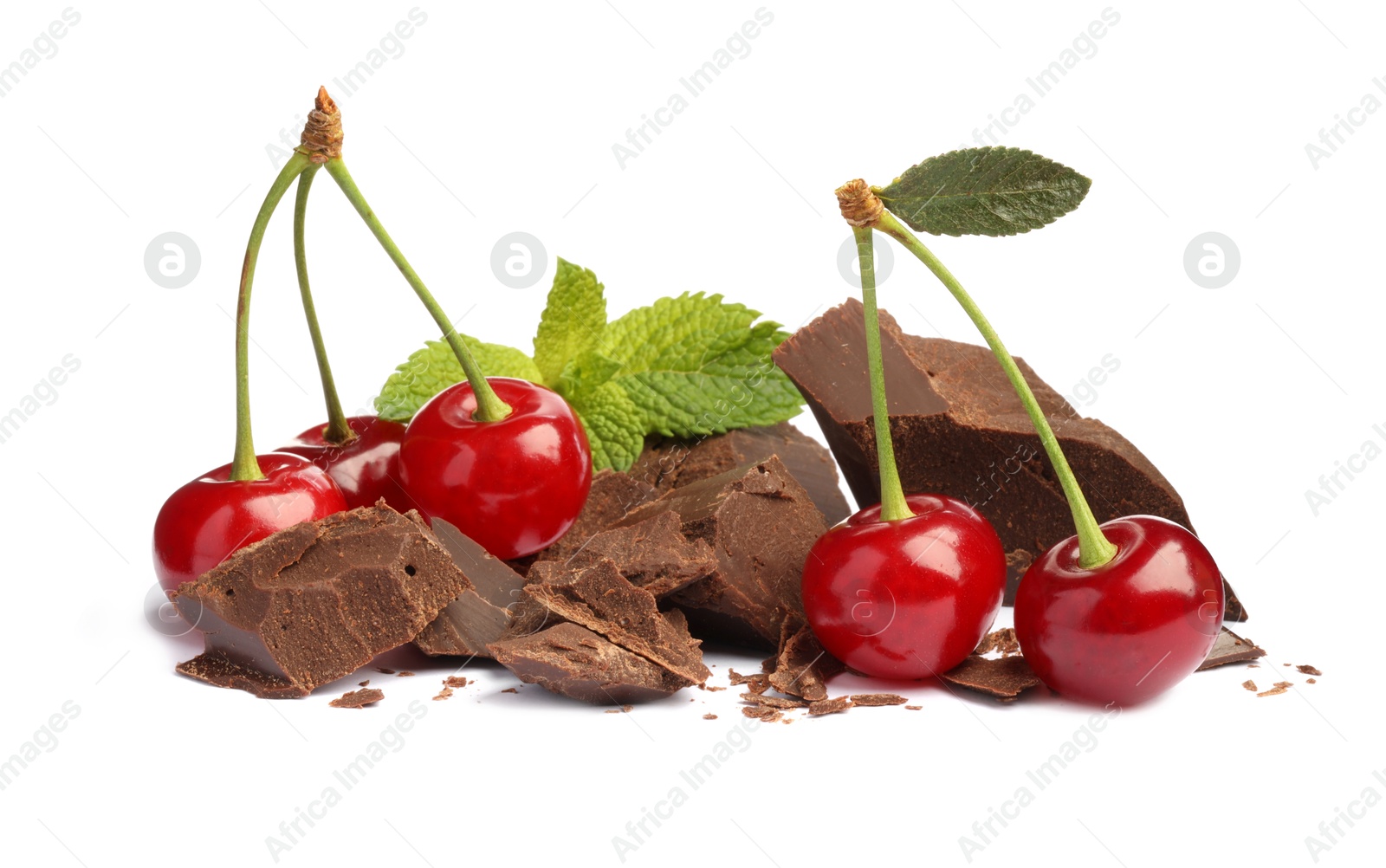 Photo of Fresh cherries with pieces of dark chocolate and mint isolated on white