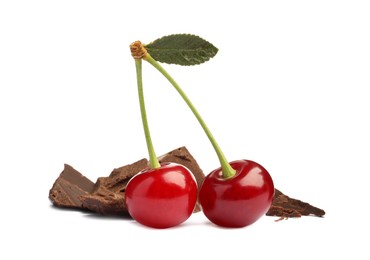 Fresh cherries with pieces of dark chocolate isolated on white