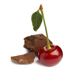 Fresh cherry with pieces of dark chocolate isolated on white