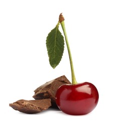 Photo of Fresh cherry with pieces of dark chocolate isolated on white