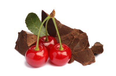 Photo of Fresh cherries with pieces of dark chocolate isolated on white