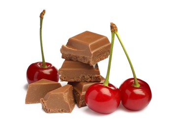 Photo of Fresh cherries with pieces of milk chocolate isolated on white