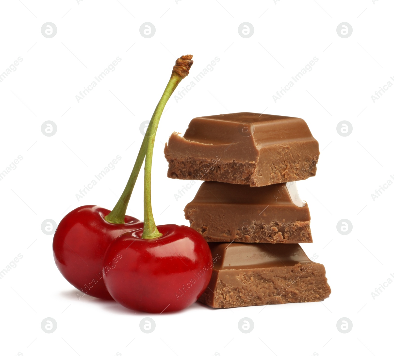 Photo of Fresh cherries with pieces of milk chocolate isolated on white