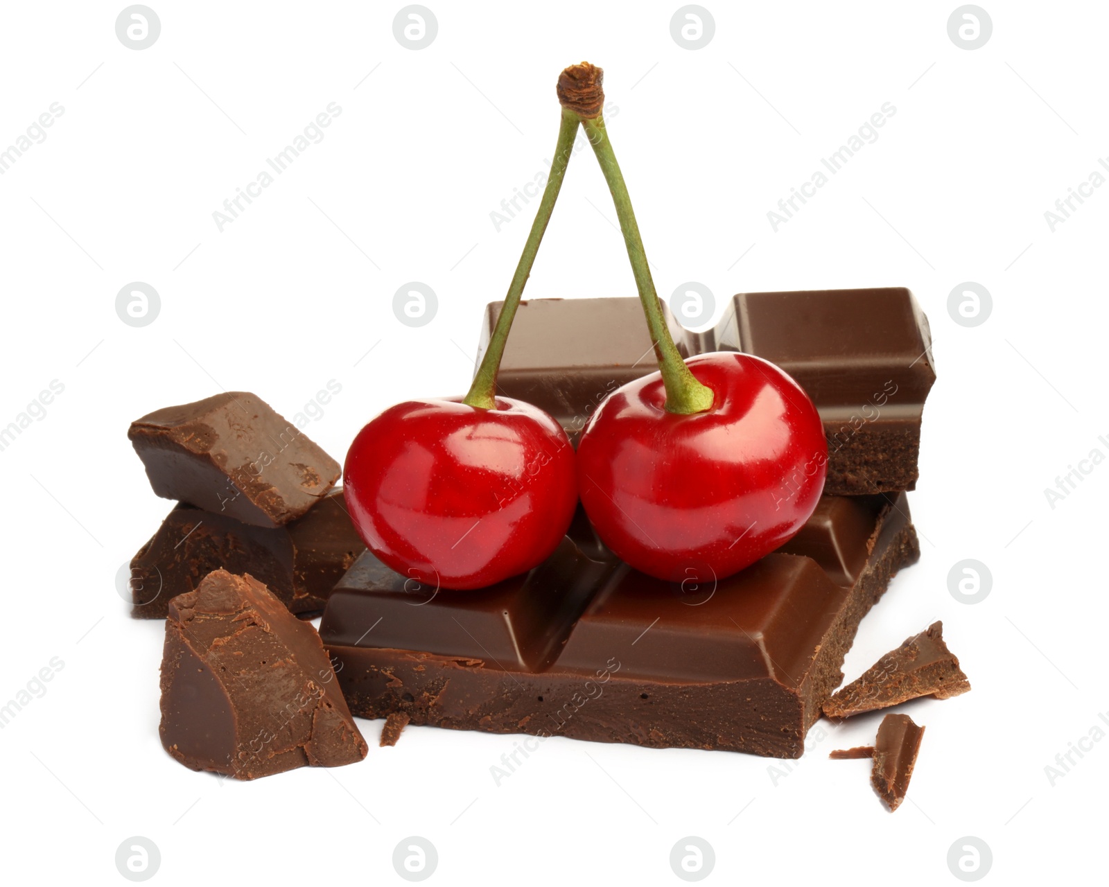 Fresh cherries with pieces of dark chocolate isolated on white Photo of Fresh cherries with pieces of dark chocolate isolated on white