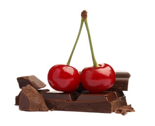 Fresh cherries with pieces of dark chocolate isolated on white