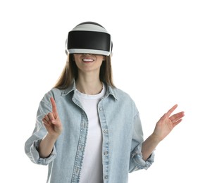 Smiling woman using virtual reality headset on white background