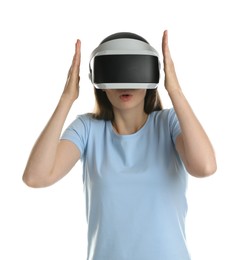 Surprised woman using virtual reality headset on white background