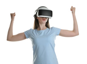 Photo of Surprised woman using virtual reality headset on white background