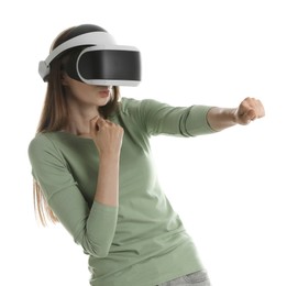 Photo of Woman using virtual reality headset on white background