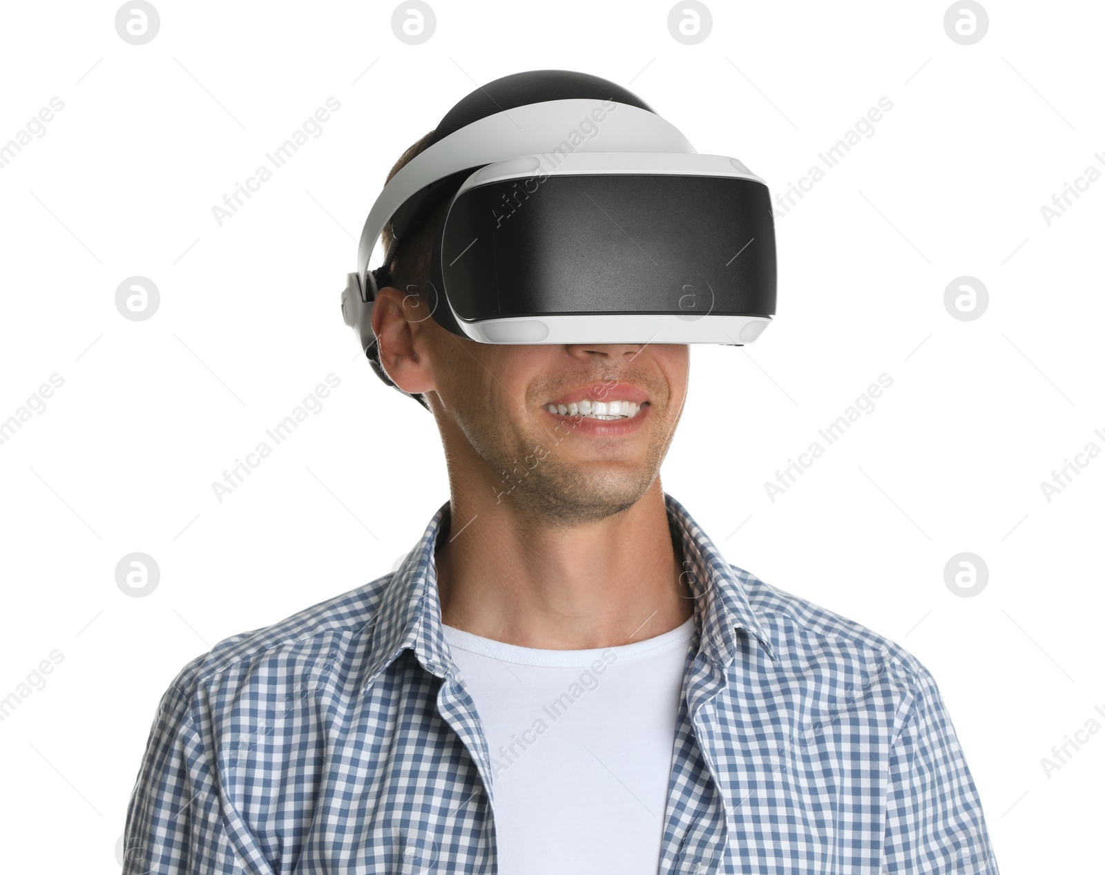 Photo of Smiling man using virtual reality headset on white background