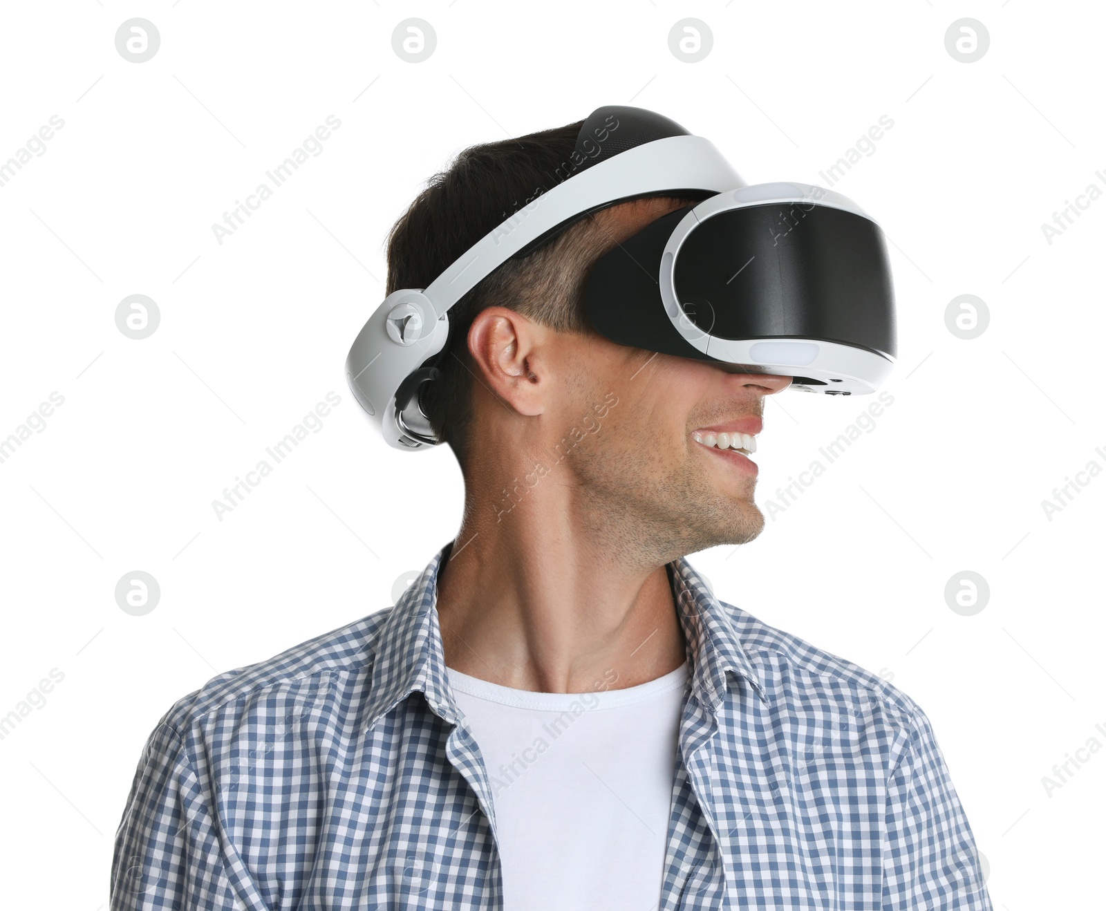 Photo of Smiling man using virtual reality headset on white background