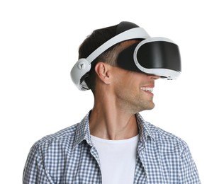 Smiling man using virtual reality headset on white background