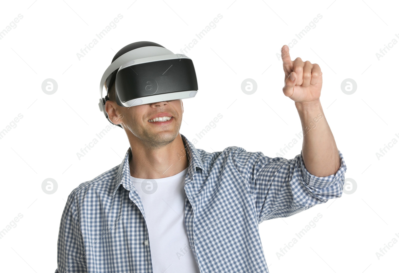 Photo of Smiling man using virtual reality headset on white background