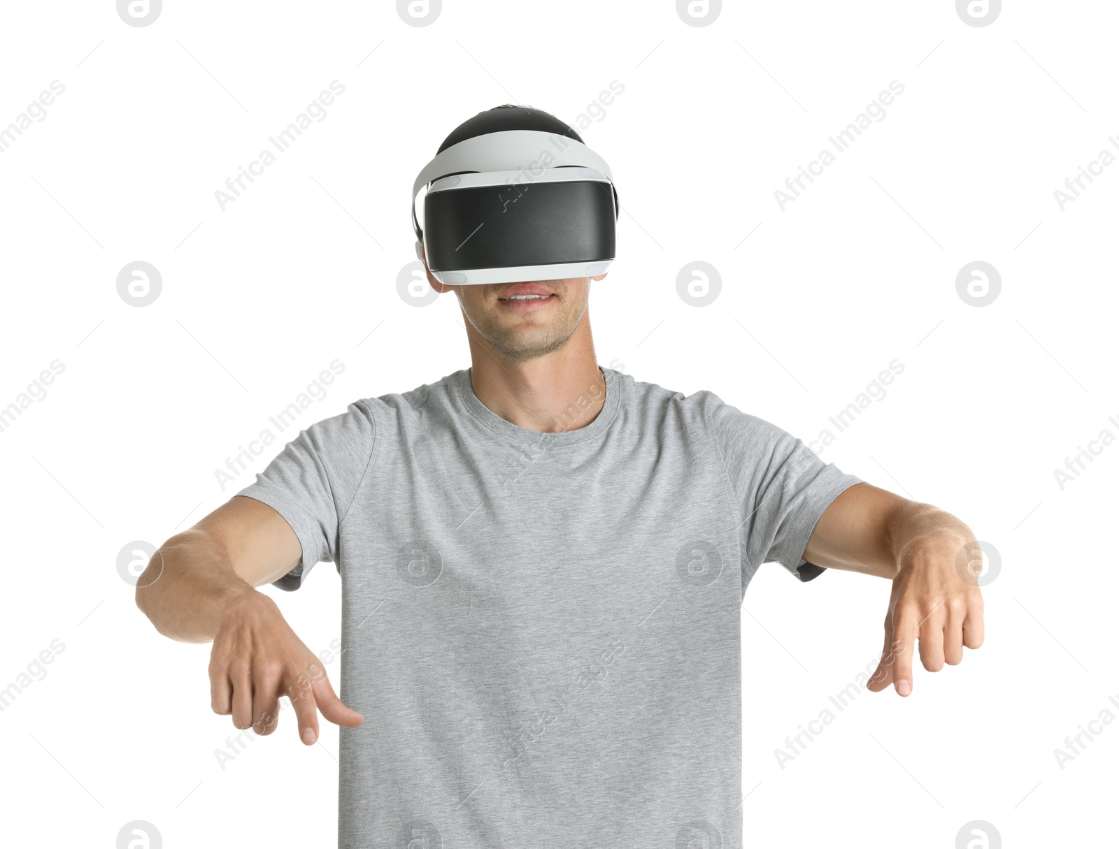 Photo of Man using virtual reality headset on white background