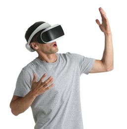 Photo of Surprised man using virtual reality headset on white background