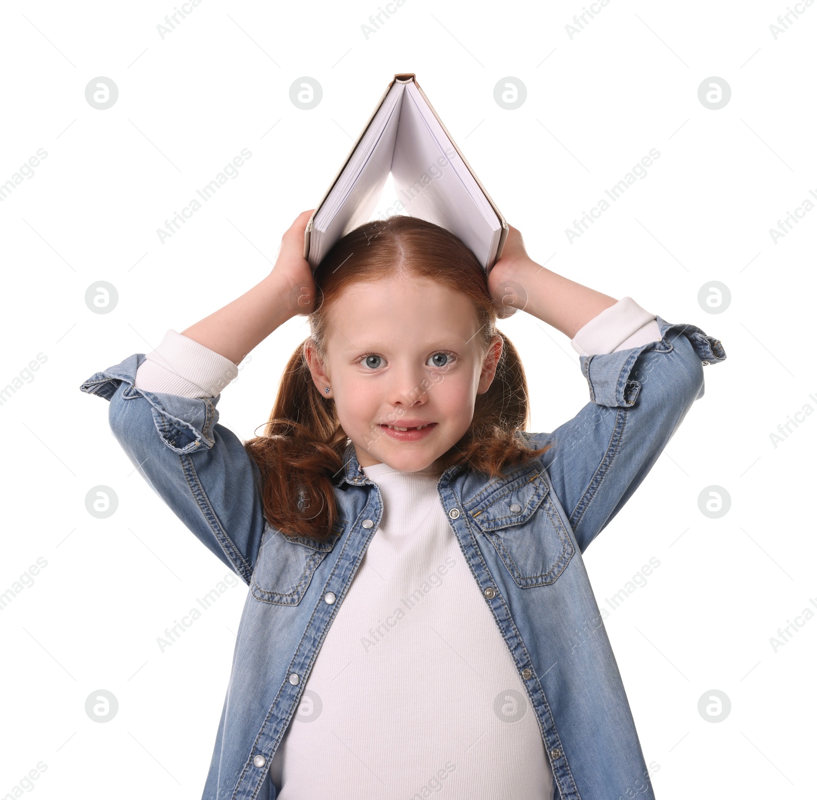 Photo of Smiling girl with book on white background