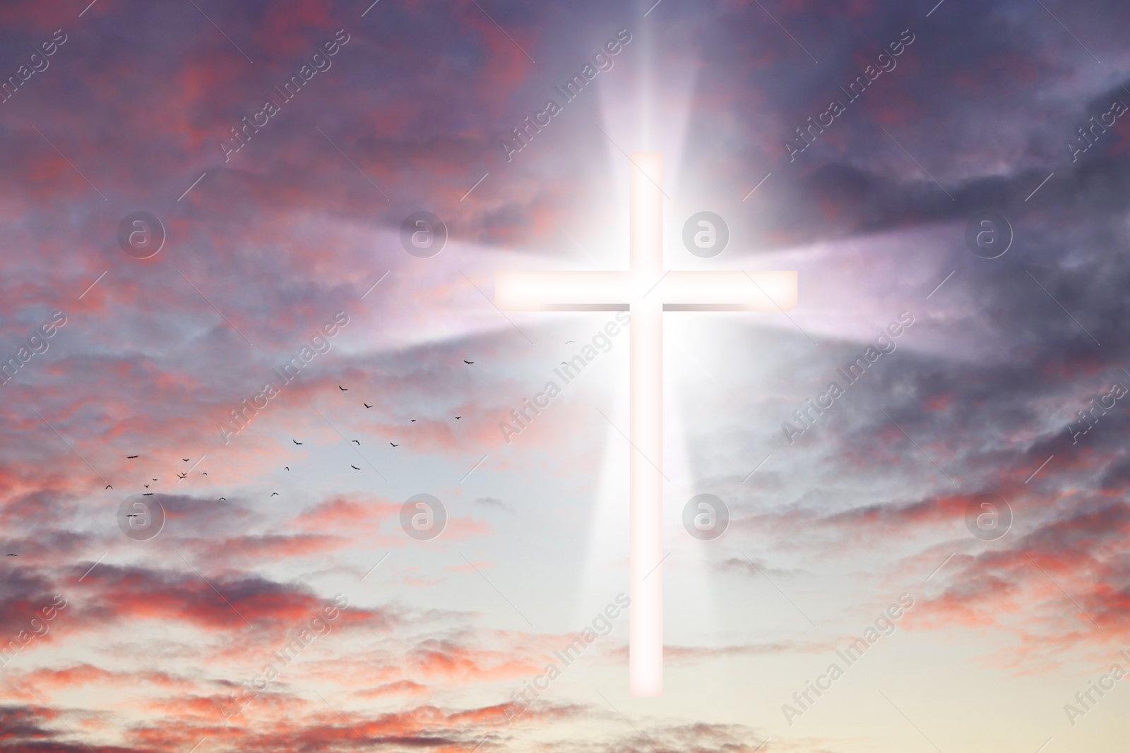 Image of Cross lit by sunlight in sky. Religion of Christianity