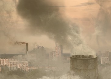 Image of Global warming concept. Industrial factory polluting air with smoke outdoors, aerial view