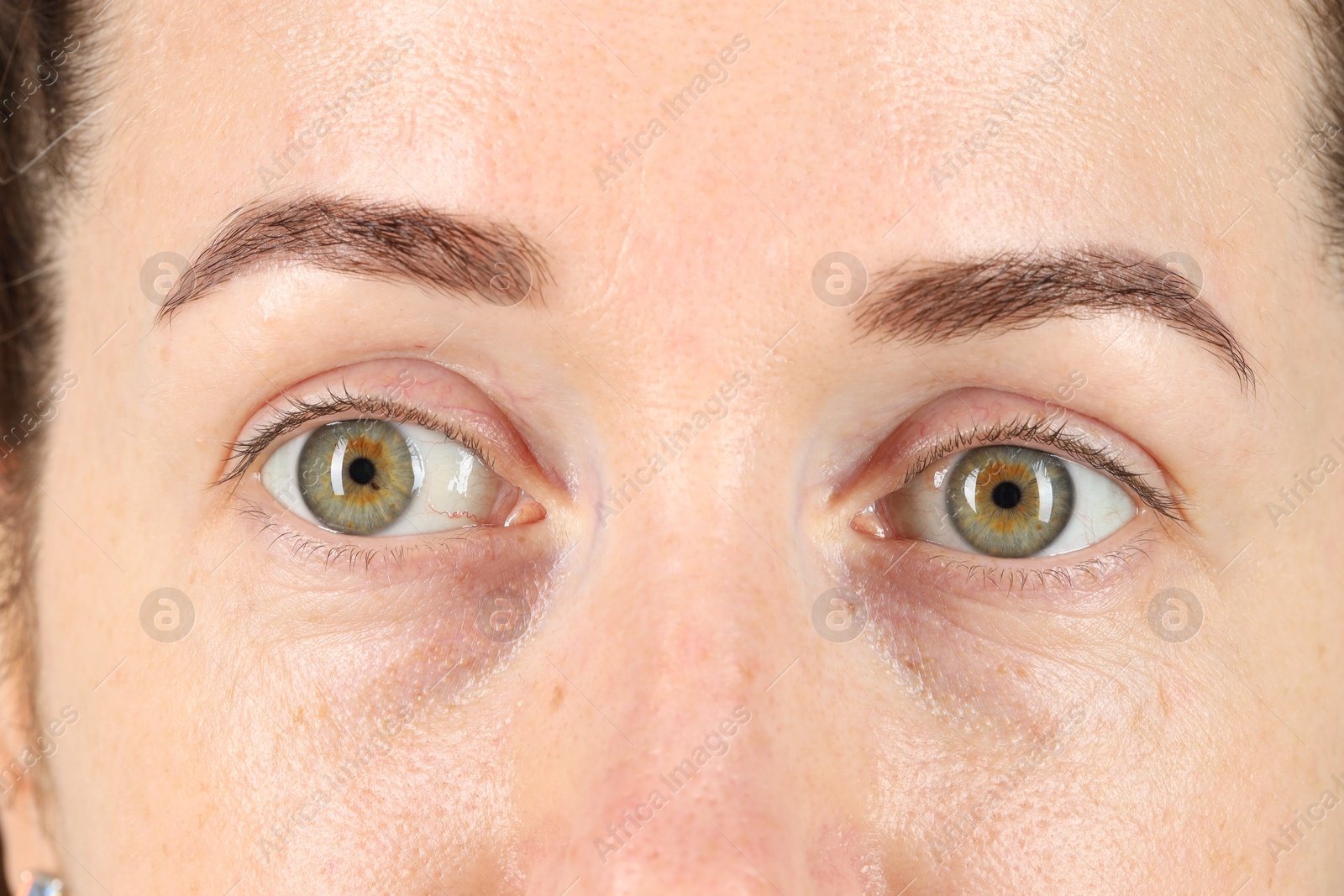 Photo of Woman with beautiful green eyes, closeup view