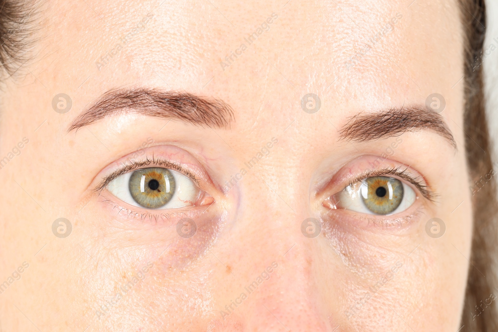 Photo of Woman with beautiful green eyes, closeup view