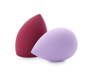 Photo of Two colorful makeup sponges isolated on white