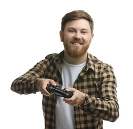 Happy man playing video game with controller on white background