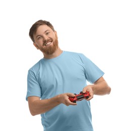 Happy man playing video game with controller on white background