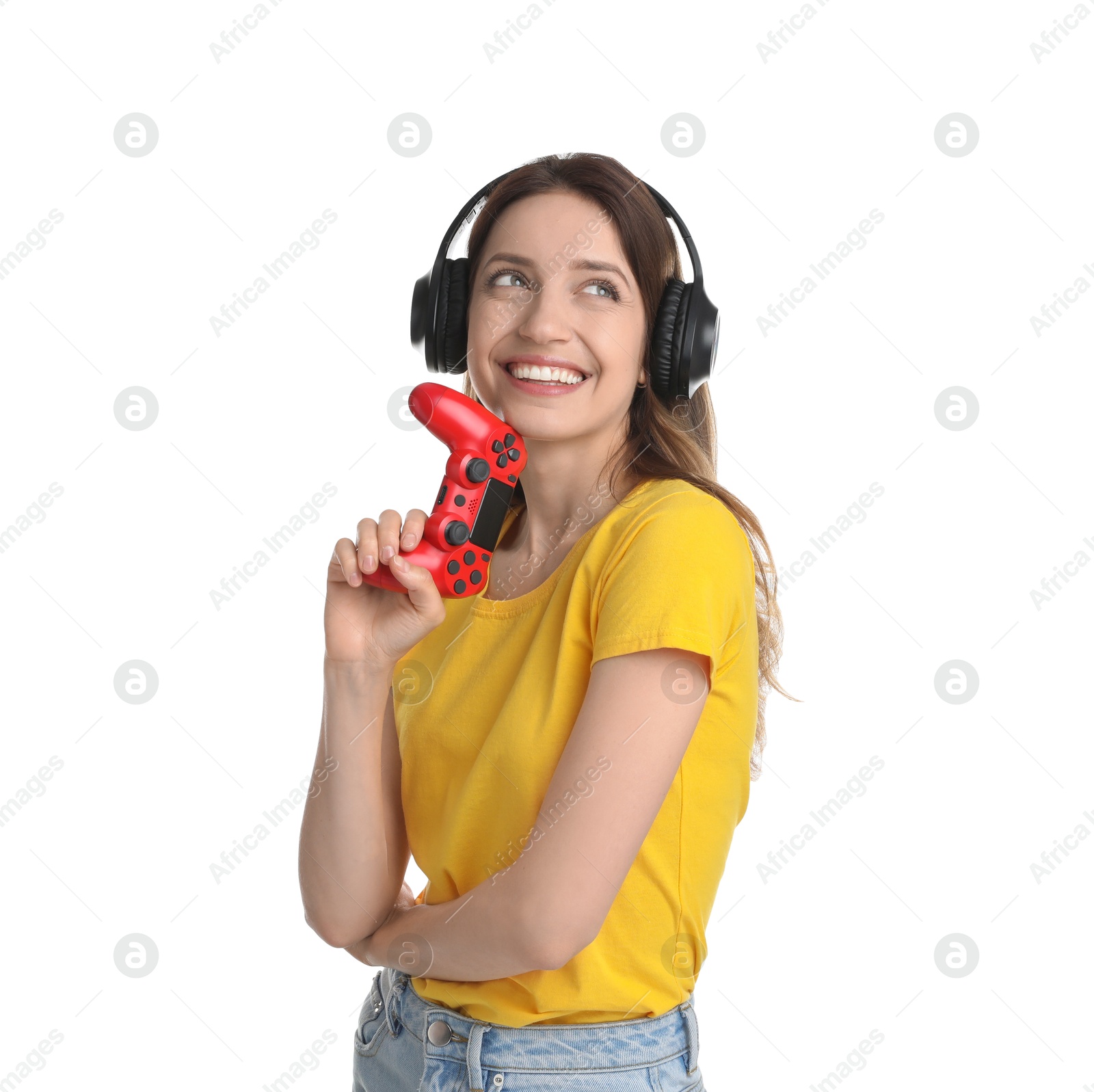 Photo of Happy woman in headphones with game controller on white background