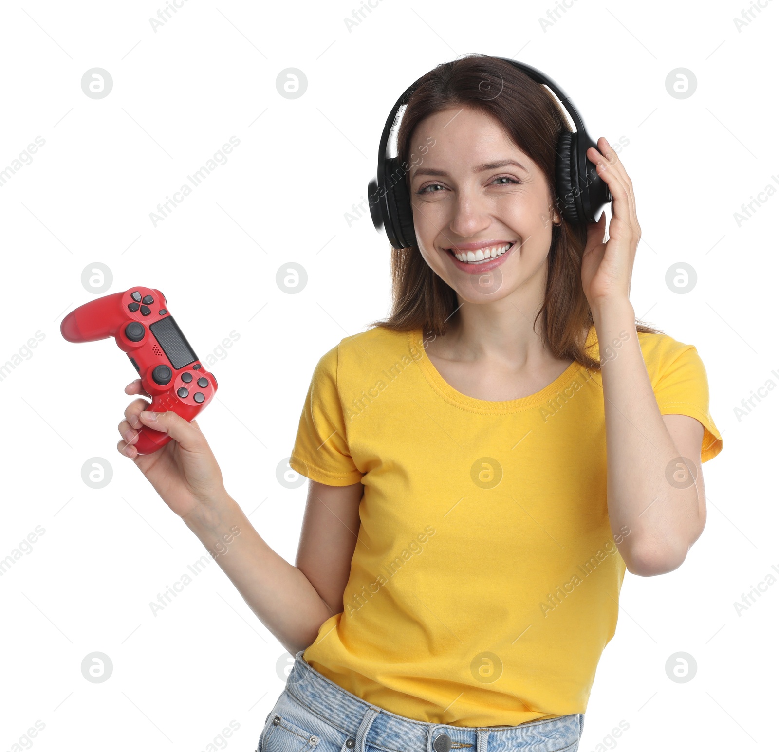 Photo of Happy woman in headphones with game controller on white background