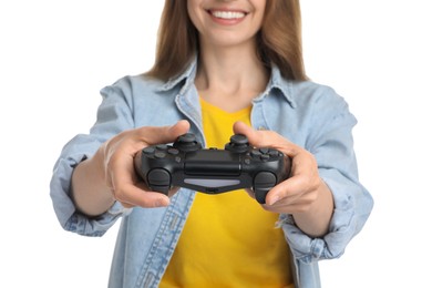 Smiling woman playing video game with controller on white background, closeup