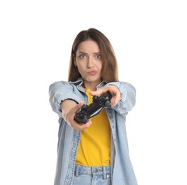 Photo of Emotional woman playing video game with controller on white background
