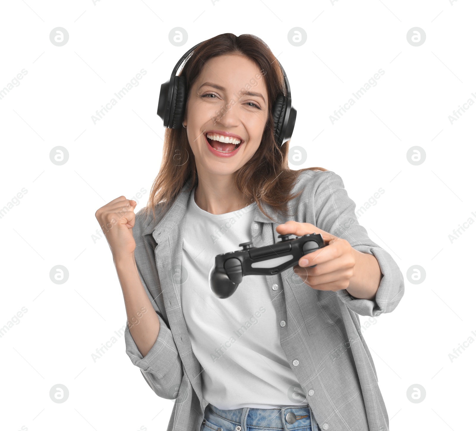 Photo of Happy woman in headphones with game controller on white background